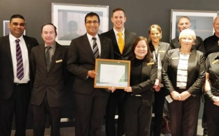 Sudima Christchurch Airport team receiving CarboNZero certification.